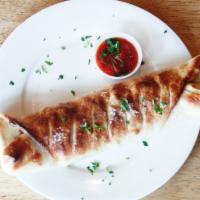 Meatball Stromboli with French fries · Served with marinara sauce 