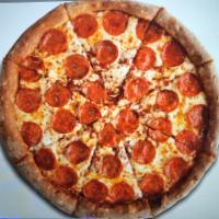 The Pepperoni · Our scratch dough. Topped with whole milk mozzarella cheese and covered with pepperoni.
