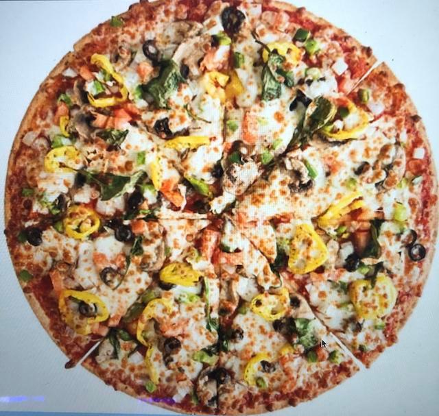 The Veggie Pizza · Our scratch dough, topped with homemade pizza sauce, banana peppers, onions, green peppers, mushrooms, fresh spinach, fresh tomato, black olives, and whole-milk mozzarella.