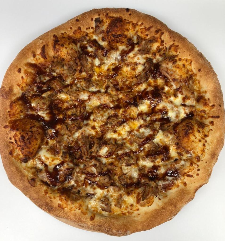 The BBQ Pork Pizza · Slow smoked BBQ pork, our signature sweet BBQ sauce and whole-milk mozzarella cheese.