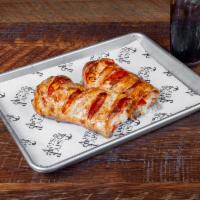 Stromboli · Like a Calzone, but lighter & crispier. Stuffed with whole-milk mozzarella cheese & your cho...