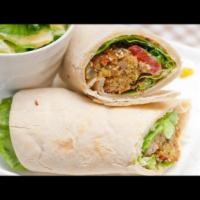 Small Falafel Wrap · Includes lettuce, tomatoes, and onions with white wrap and your choice of sauce. Add topping...