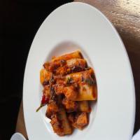Paccheri E Polipo · Octopus Ragu, San Marzano Tomatoes, Calabrian Chili, Fresh Parsley, Toasted Breadcrumbs