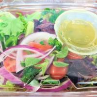 Tuscan Salad · Mixed Greens with Lemon Dressing and a little onion and tomato. Dressing comes on the side.