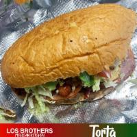 Torta Pastor Combo Platter · Mexican sandwiches with Monterey Jack cheese / Onion / Tomatoes / Avocado / Lettuce 
Rice/ B...