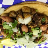 Taco Mexicano · 7”Tortilla Maiz, Carne Asada Enchilada, Frijoles, Cilantro, Cebolla.
7”Corn Tortilla, Steak ...