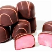 Box of 20 Raspberry Creams · Hidden beneath each chocolate bite you'll find a deliciously soft and smooth raspberry cream...