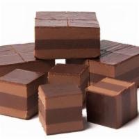 Box of 8 Hazelnut Truffle Squares  · These decadent three-layered Hazelnut Truffle Squares consist of a rich dark chocolate Hazel...