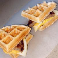 Waffle sandwich  · Your choice of bacon or sausage, eggs and American cheese in between 2 warm waffles. Served ...