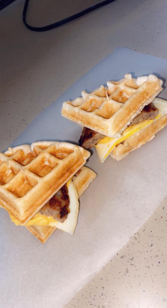 Waffle sandwich  · Your choice of bacon or sausage, eggs and American cheese in between 2 warm waffles. Served with syrup 