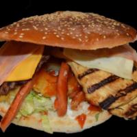 Super Wakala Burger · Meat, chicken, beef chorizo, mayonnaise, lettuce, tomato, onion, 3 bacon, 2 yellow cheese, 1...