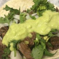 Order of 4 Steak Tacos  · Steak tacos with grilled onion, cilantro, red and green sauce 
