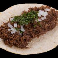 Barbacoa Tacos · Cilantro, onions , green and red sauce 