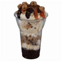 Chocolate Chip Cookie Dough Layered Sundae · 3 scoops Ice Cream with layers of hot fudge and cookie dough pieces, topped with caramel. De...