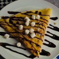 S'mores Crepe · Milk chocolate chip, graham crackers, marshmallows, and powder sugar.