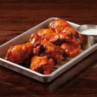 Wings · Traditional or boneless wings with BBQ, buffalo, or sweet chili sauce. Served with ranch or ...