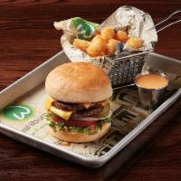 The Double Decker · Move into a Double Decker with TWO 1/4 lb. burger patties! lettuce, tomato, onion, governmen...