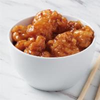 Sweet Orange Chicken · Crispy, tempura chicken tossed in our sweet and tangy orange flavored sauce.