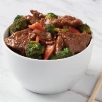 Beef with Broccoli · Prepared with marinated beef, broccoli and carrots in a light brown sauce.
