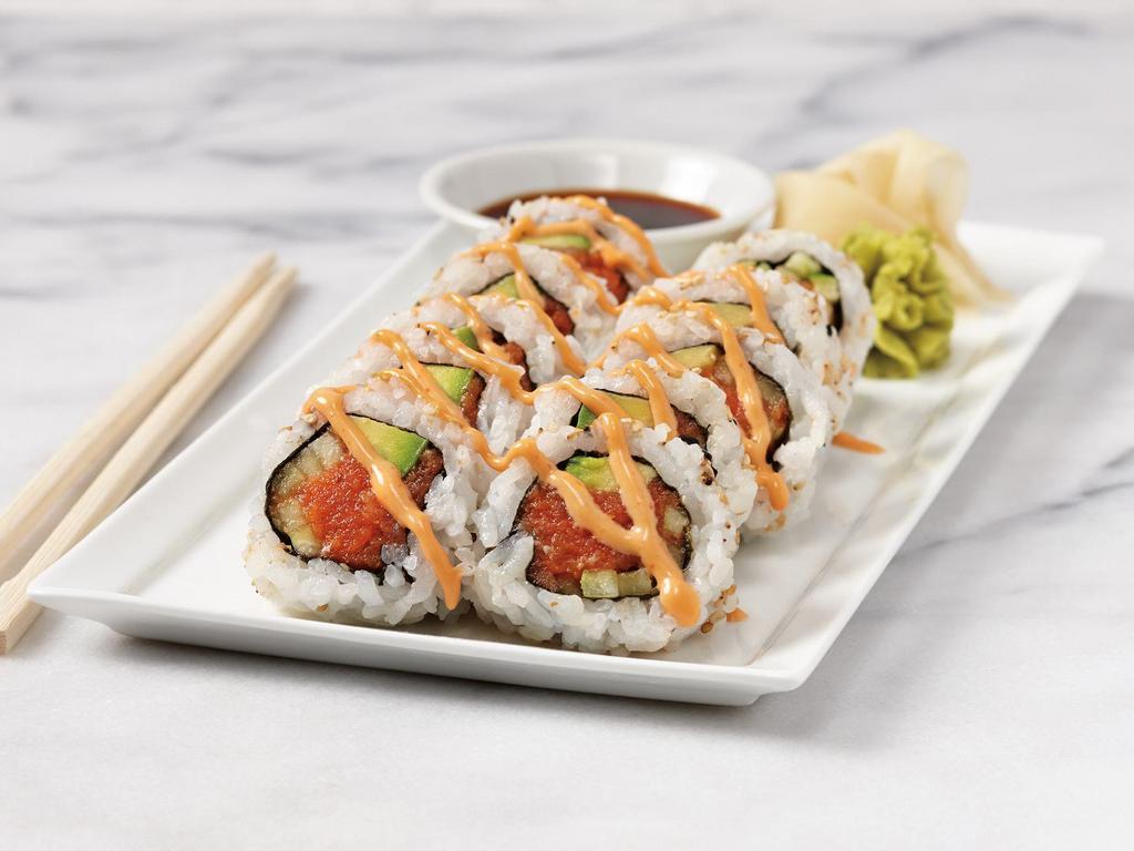 Spicy Tuna Roll · Sushi rice, nori, roasted sesame seeds, spicy tuna, avocados, cucumbers, spicy sauce, soy sauce, ginger, wasabi. 10 pieces.