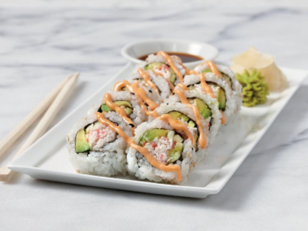 Spicy California Roll · Sushi rice, nori, roasted sesame seeds, imitation crab mix, avocado, cucumber, spicy sauce, soy sauce, ginger and wasabi. 10 pieces.