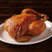 Rotisserie Chicken - Served Hot · A whole rotisserie chicken seasoned to perfection, a meal guaranteed to satisfy your hunger.