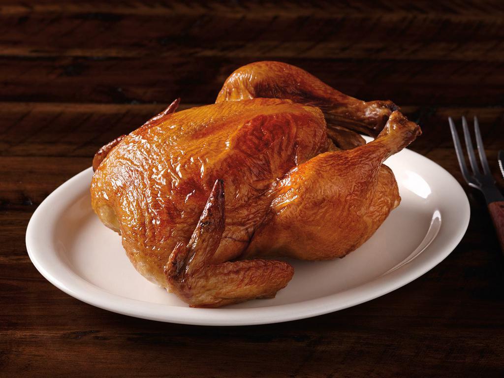 Rotisserie Chicken - Served Hot · A whole rotisserie chicken seasoned to perfection, a meal guaranteed to satisfy your hunger.