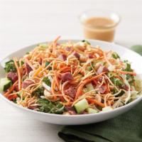 Dilusso Asian Noodle Salad · Kale and green cabbage topped with diced beef, cucumbers, carrots, crispy rice noodles, and ...