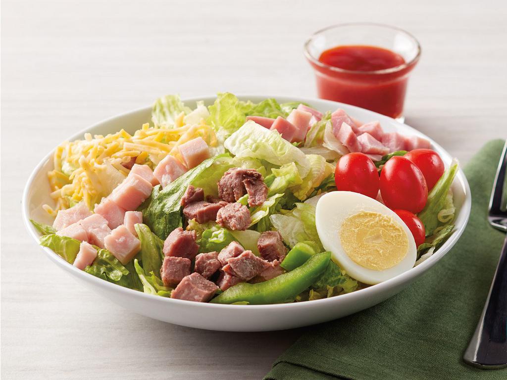 Dilusso Classic Chef Salad · Romaine lettuce with tomatoes, eggs, diced ham, diced turkey, diced beef, Colby-jack cheese and green bell pepper. 