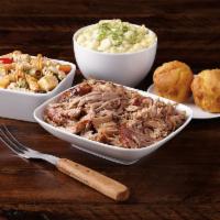 Pulled Pork Dinner for 2 - Served Hot · Includes 1 pound of Pulled Pork- sauced or unsauced, 2 pint sides and 2 dinner rolls.