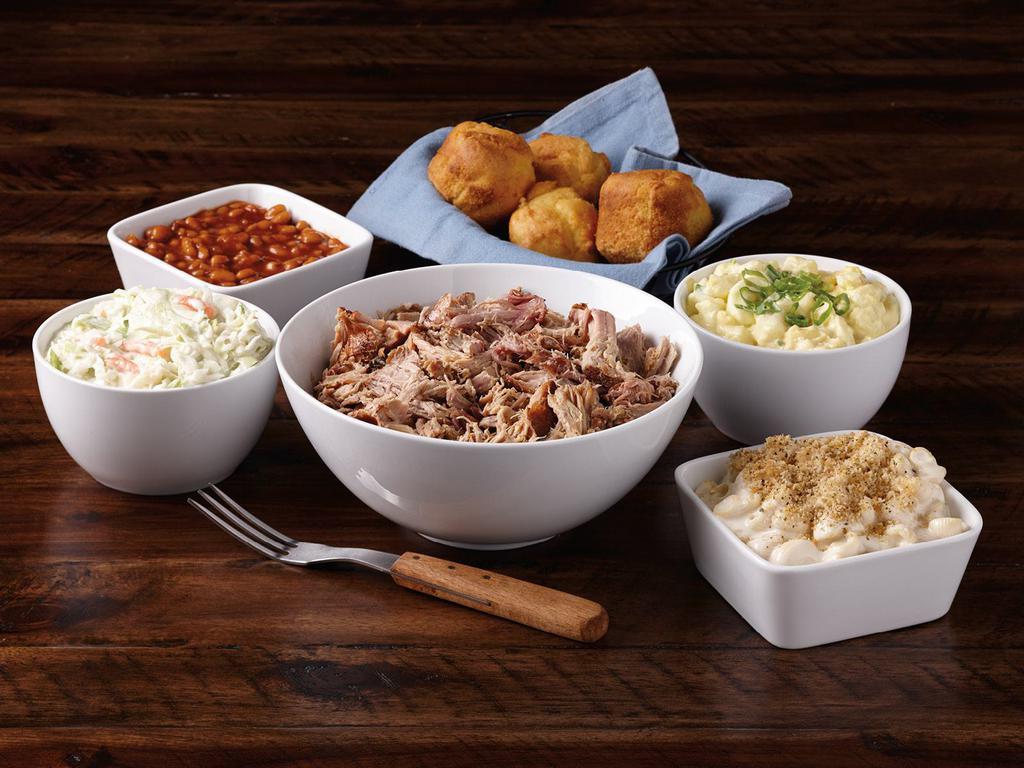 Pulled Pork Dinner for 4 - Served Hot · Includes 2 pounds of Pulled Pork - sauced or unsauced, 4 pint sides of your choice and 4 corn muffins. 