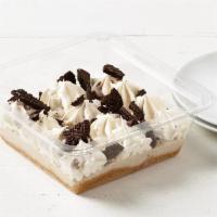 Cookies n Cream Cheesecake · Cookies and Cream flavored cheesecake filling over a graham cracker base. Topped with crushe...
