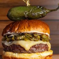 Asadero Green Chile Burger · A half lb. of premium ground beef or chicken served with green chiles, asadero cheese and ou...