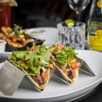 Rib Eye tacos · A half lb of premium rib eye seasoned with our signature spices. Served with a side of mashe...