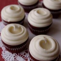 Red Velvet Cupcake · A southern classic…a mild cocoa flavor with a bright red color. Frosted in Cream Cheese fros...