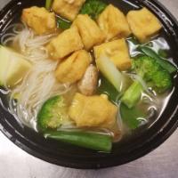 Vegetable Tofu Soup · Cooked dry noddles will pack separately with soup and all delicious stuff!