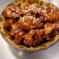 Sesame Chicken · Served in a sweet sauce served with sesame seeds.