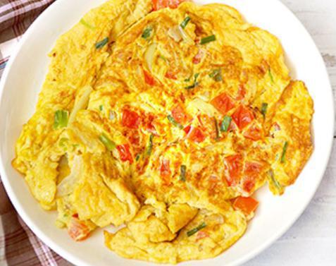 Western Omelette · Onions, peppers and turkey or ham. Served with home fries, hash brown and toast.