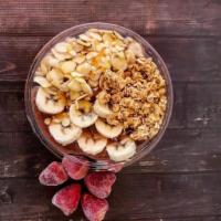 Acai - You Bowl · Organic acai topped with sliced banana, raw almonds, granola and honey drizzle.