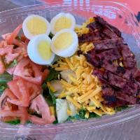 Cobb  · Lettuce, tomato, hard-boiled egg, Turkey bacon, bleu cheese crumbles and organic ranch dress...