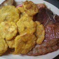 UNA)Chuletas con Tostones Lunch Special (ONE · Fried pork chops with fried plantains
