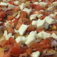 Bruschetta Pizza · Tomatoes, onions and basil with fresh mozzarella.