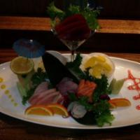Sashimi Regular · 15 piece of assorted fish. Served with soup or salad. 