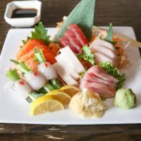 Sashimi Deluxe · 18 piece of assorted fish. Served with soup or salad. 