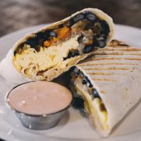 Breakfast Burrito · Scrambled eggs, hashed potatoes, onions, green peppers, black beans, provolone, and pickled ...