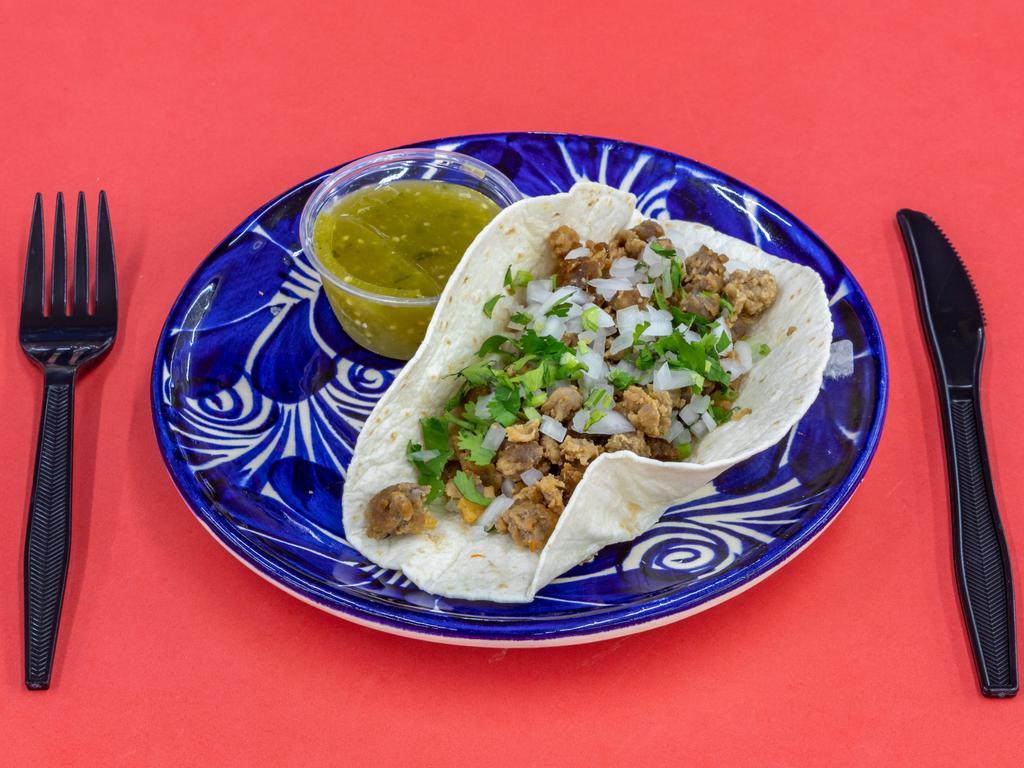 Taco - Tortilla de Harina · Tortilla, choice of meat, and toppings 