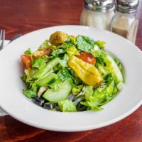 House Salad · Romaine lettuce, cherry tomato, pepperoncini pepper, cucumber, olives and onions.