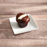 Chocolate Cream · Chocolate Cupcake filled with Whip Cream topped with Chocolate Fudge Icing and a Swirl of Va...