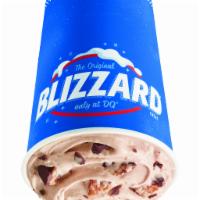 Snickers® Blizzard® Treat · Snickers® pieces and chocolatey topping blended with cream DQ® vanilla soft serve blended to...