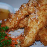 Coconut Chicken Finger · Tender sliced white chicken meat dipped in homemade coconut batter, coated with panko breadc...